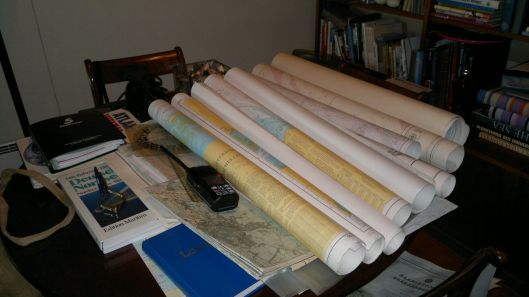 Lots of sea charts and books in addition to electronic navigational aids.